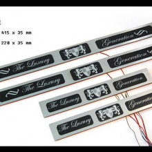 Тюнинг салона - хромированные накладки на пороги в салон со светодиодной подсветкой - от компании ArtX.