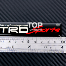 Стикер шильд TRD Sports под прозрачной смолой, на алюминиевой основе. Размер 100 * 24 мм. Черный.