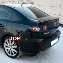 Клыки на задний бампер на Mazda 3 BK