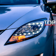 Передние тюнинг фары Bifocal Xenon Ready BLACK на Mazda 6 GH