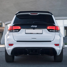 Задний бампер с диффузором Tyrannos (под центральный выхлоп) на Jeep Grand Cherokee WK2