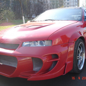 Передний бампер - Обвес NTC на Opel Calibra A