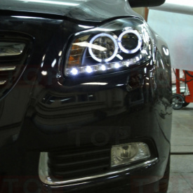 Передняя тюнинг-оптика  с ангельскими глазками на Opel Insignia 1