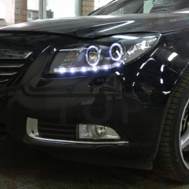 Передняя тюнинг-оптика  с ангельскими глазками на Opel Insignia 1