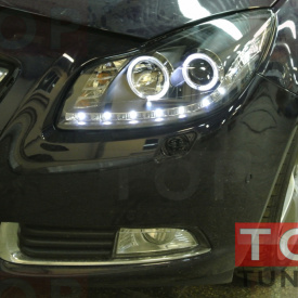 Передняя тюнинг-оптика  с ангельскими глазками на Opel Insignia 1