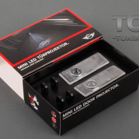 Проекторы логотипа в двери MINI