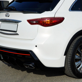 Задний бампер Draco SLIM с насадками  для Infiniti QX70 (FX35, 37, 50)