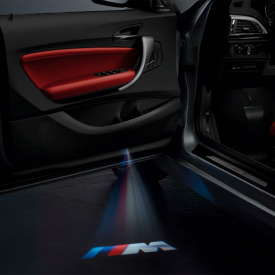 Проекторы логотипа в двери BMW