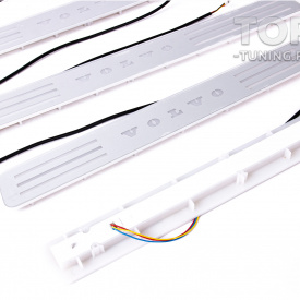 Внутренние накладки порогов с RGB подсветкой — тюнинг Volvo S90