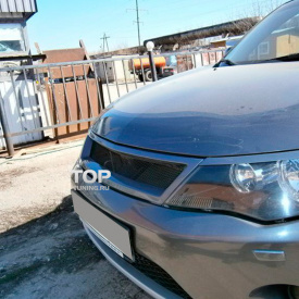 Решетка радиатора Roadest узкая на Mitsubishi Outlander 2
