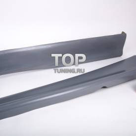 Накладки на пороги Rieger на Audi A4 B5