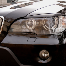 Накладки на переднюю оптику A`PEX на BMW X5 E70