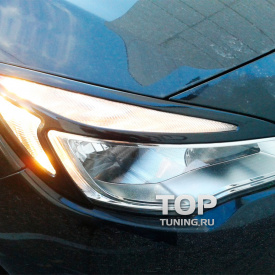 Реснички на фары GT на Opel Astra J