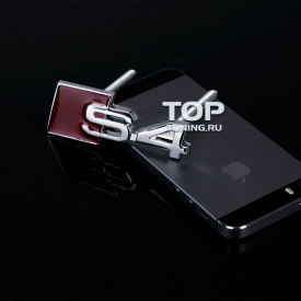 Шильдик в решетку радиатора S4 на болтах на Audi