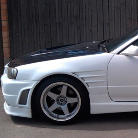 Передние крылья  +25мм. на Nissan Skyline R34