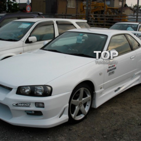 Передний бампер C-West на Nissan Skyline R34