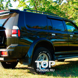 Спойлер пятой двери с стоп-сигналом на Mitsubishi Pajero