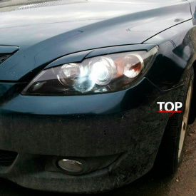 Накладки на фары Sport Line на Mazda 3 BK