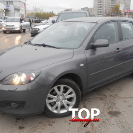 Заглушки омывателей фар на Mazda 3 BK