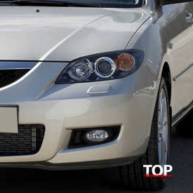 Заглушки омывателей фар на Mazda 3 BK