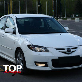 Заглушки омывателей фар на Mazda 3 BK