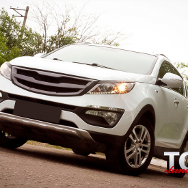 Накладка на передний бампер X-Force на Kia Sportage 3 (III)