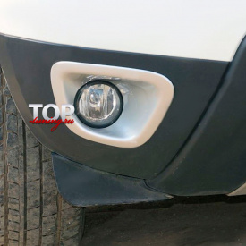 Декоративные облицовки ПТФ на Renault Duster 1