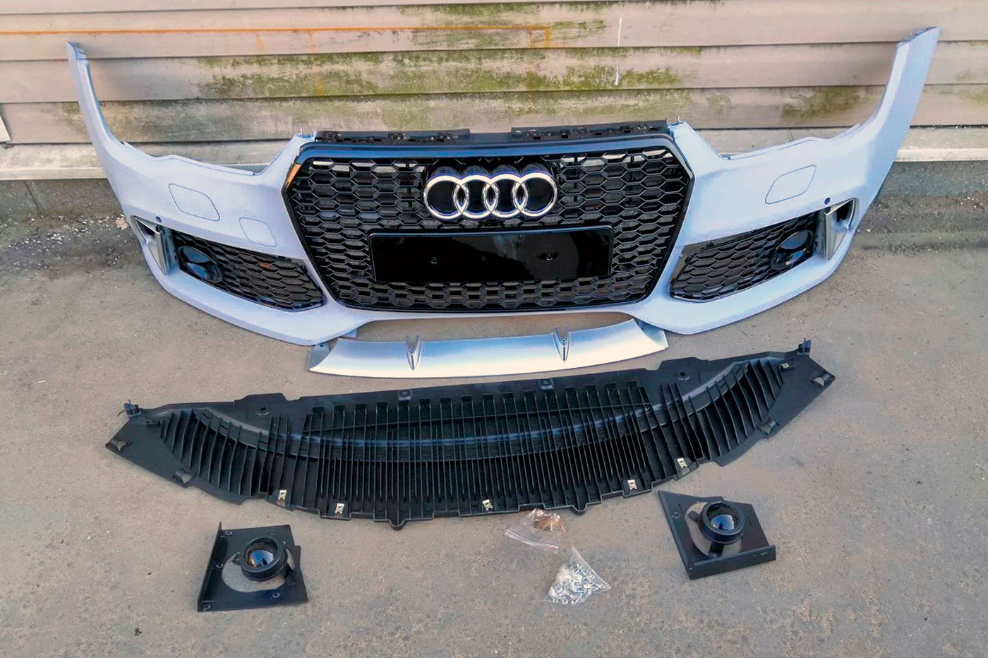 Бампер РС7 для Ауди А7 2010-2014, новый под окраску, в сборе с решетками