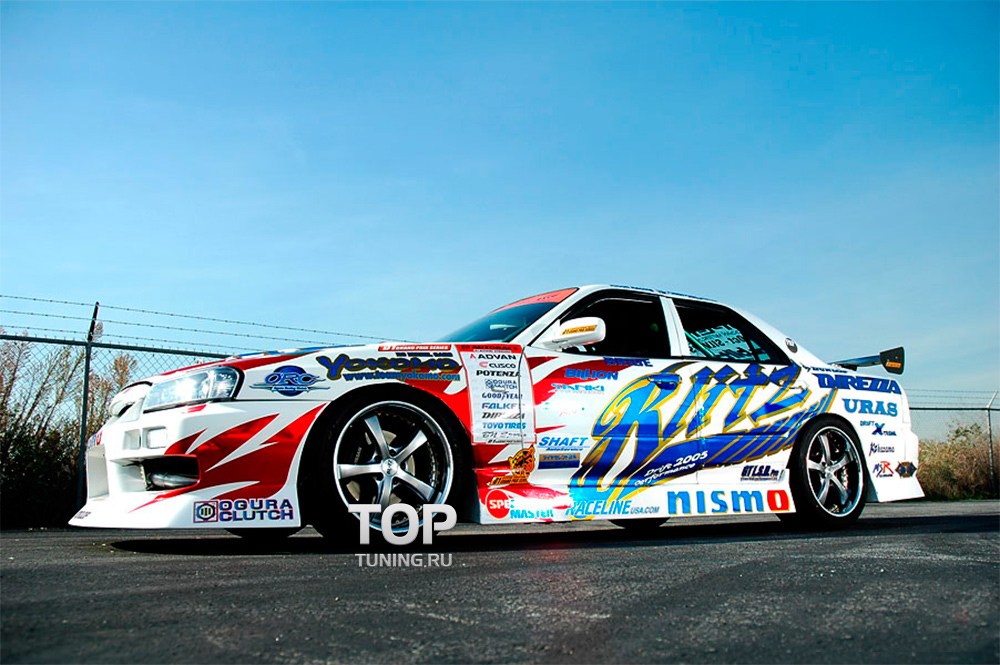 6198 Передний бампер Uras на Nissan Skyline R34