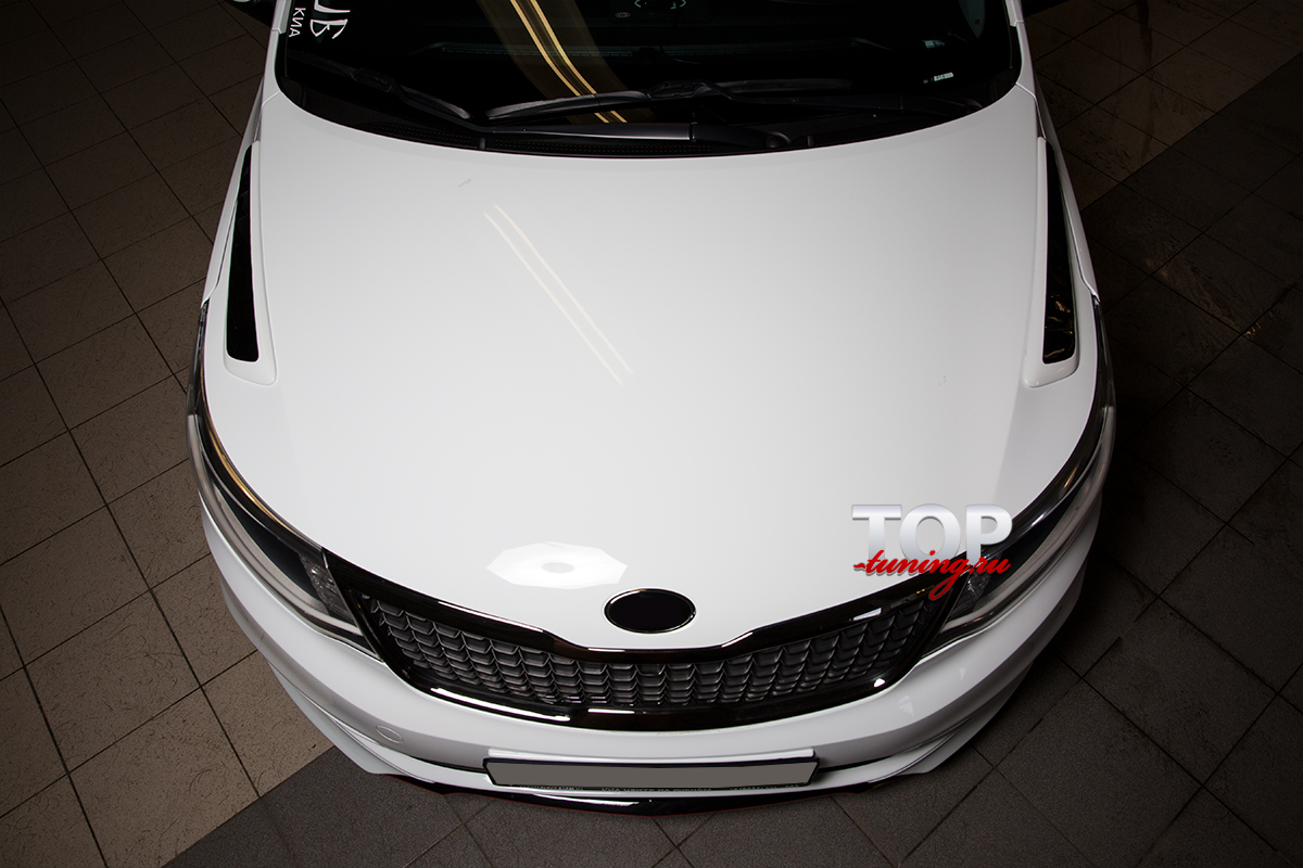 8748 Комплект обвеса Evolution (РЕСТАЙЛИНГ) на Kia Rio 3