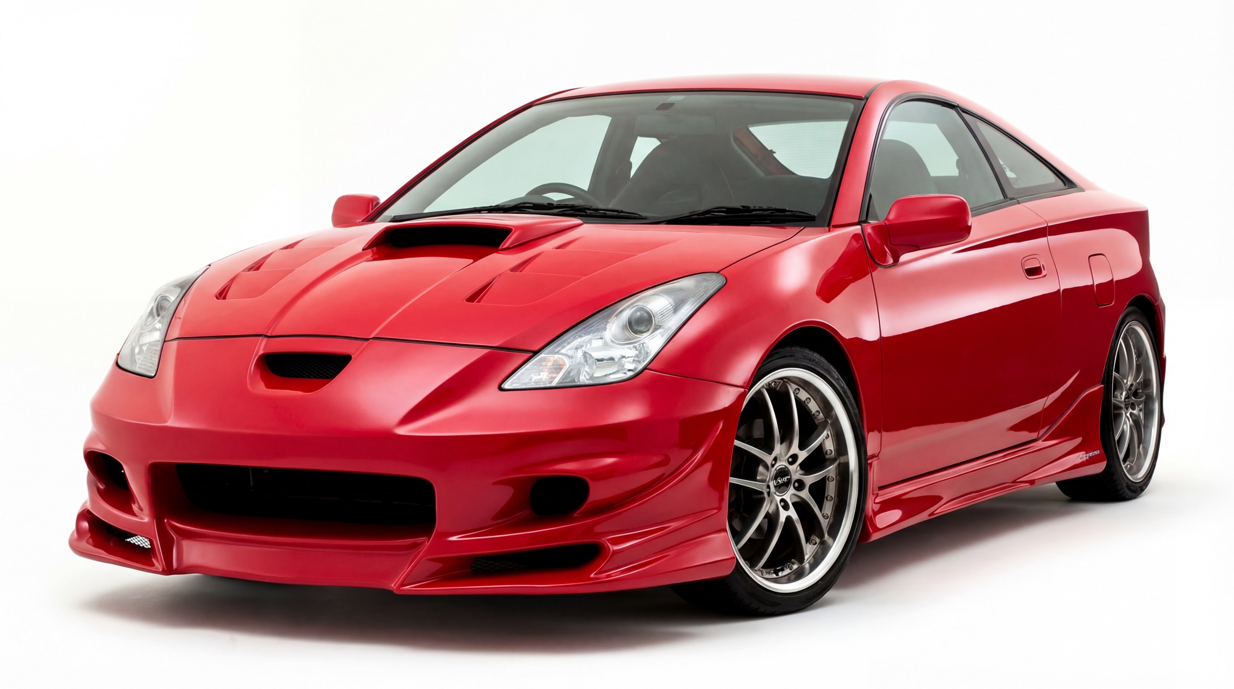 9672 Передний бампер Varis – тюнинг Toyota Celica ST231 Купить передний бампер Varis для Toyota Celica ST231. Готовый обвес из стеклопластика под покраску. Агрессивный стайлинг, требует профессиональной установки и подгонки. Доставка