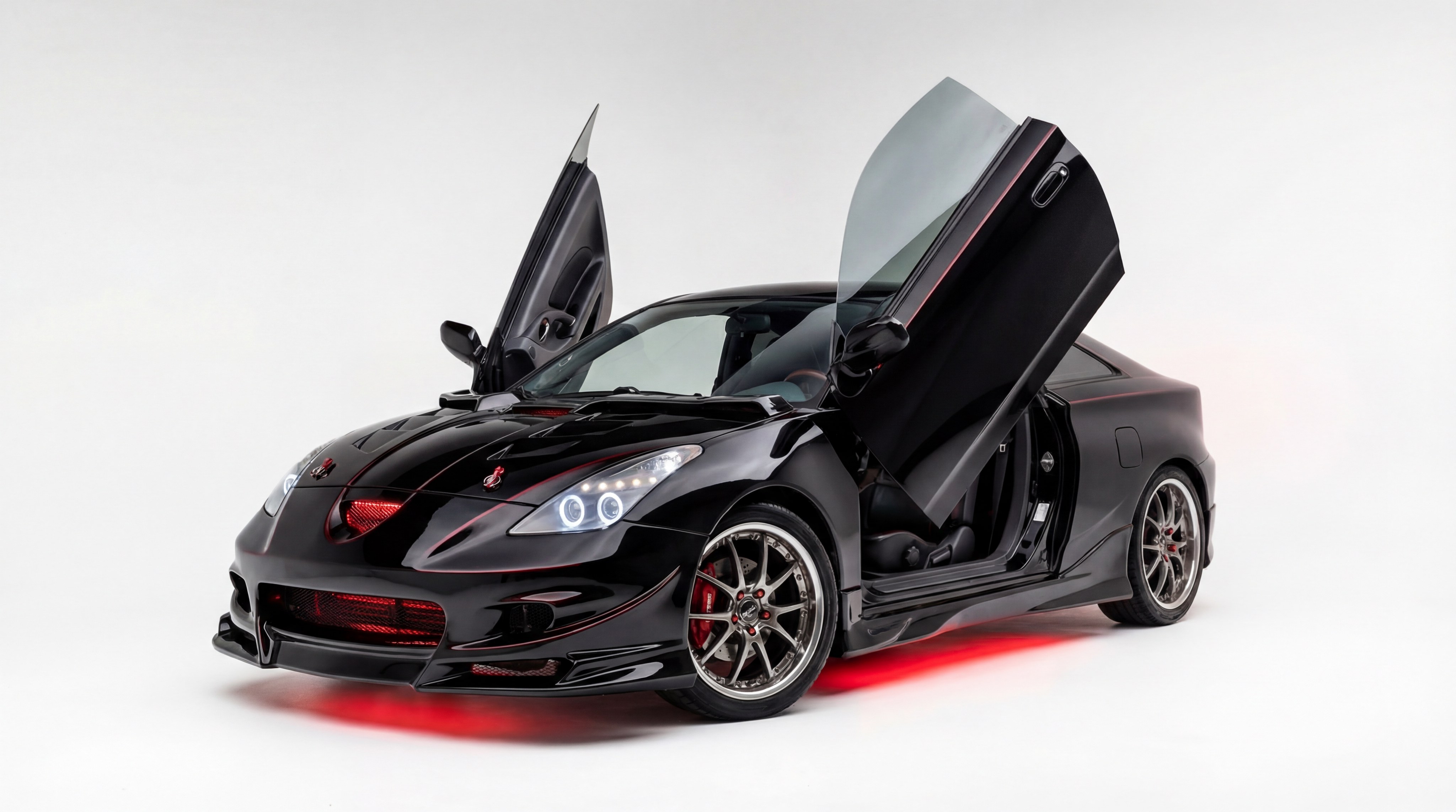 Купить передний бампер Varis для Toyota Celica ST231. Готовый обвес из стеклопластика под покраску. Агрессивный стайлинг, требует профессиональной установки и подгонки. Доставка 9672 Передний бампер Varis – тюнинг Toyota Celica ST231