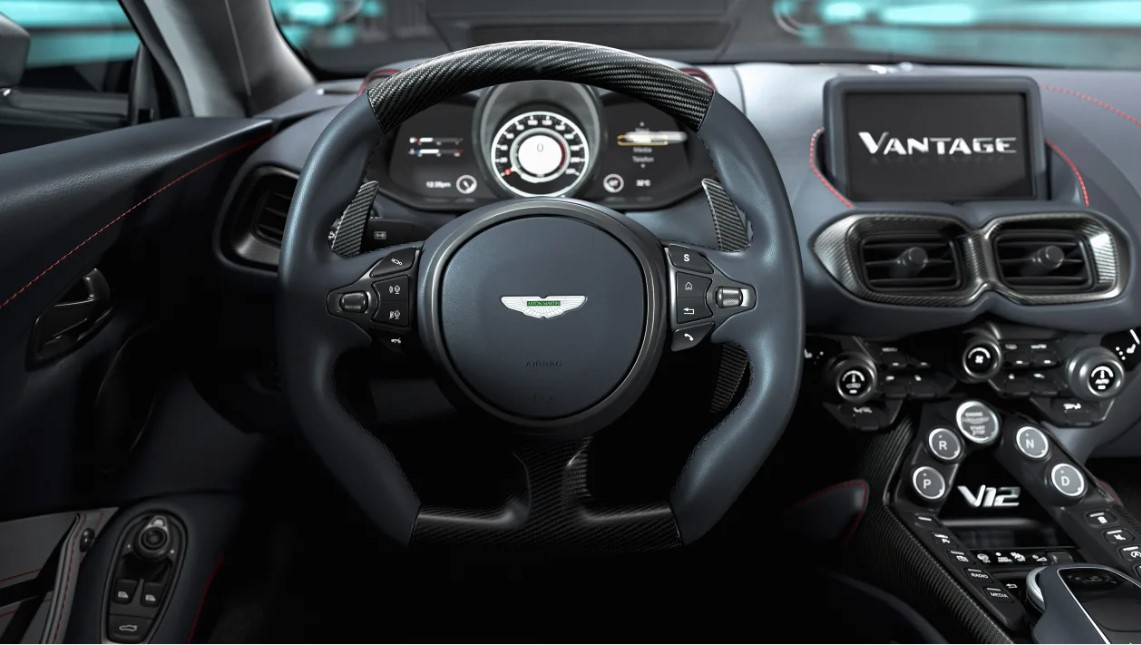 Мощность передается через специально откалиброванную восьмиступенчатую автоматическую коробку передач ZF только на задние колеса, в отличие от полноприводного Porsche 911 Turbo S, который считается ключевым соперником Aston. V12 Vantage также получил