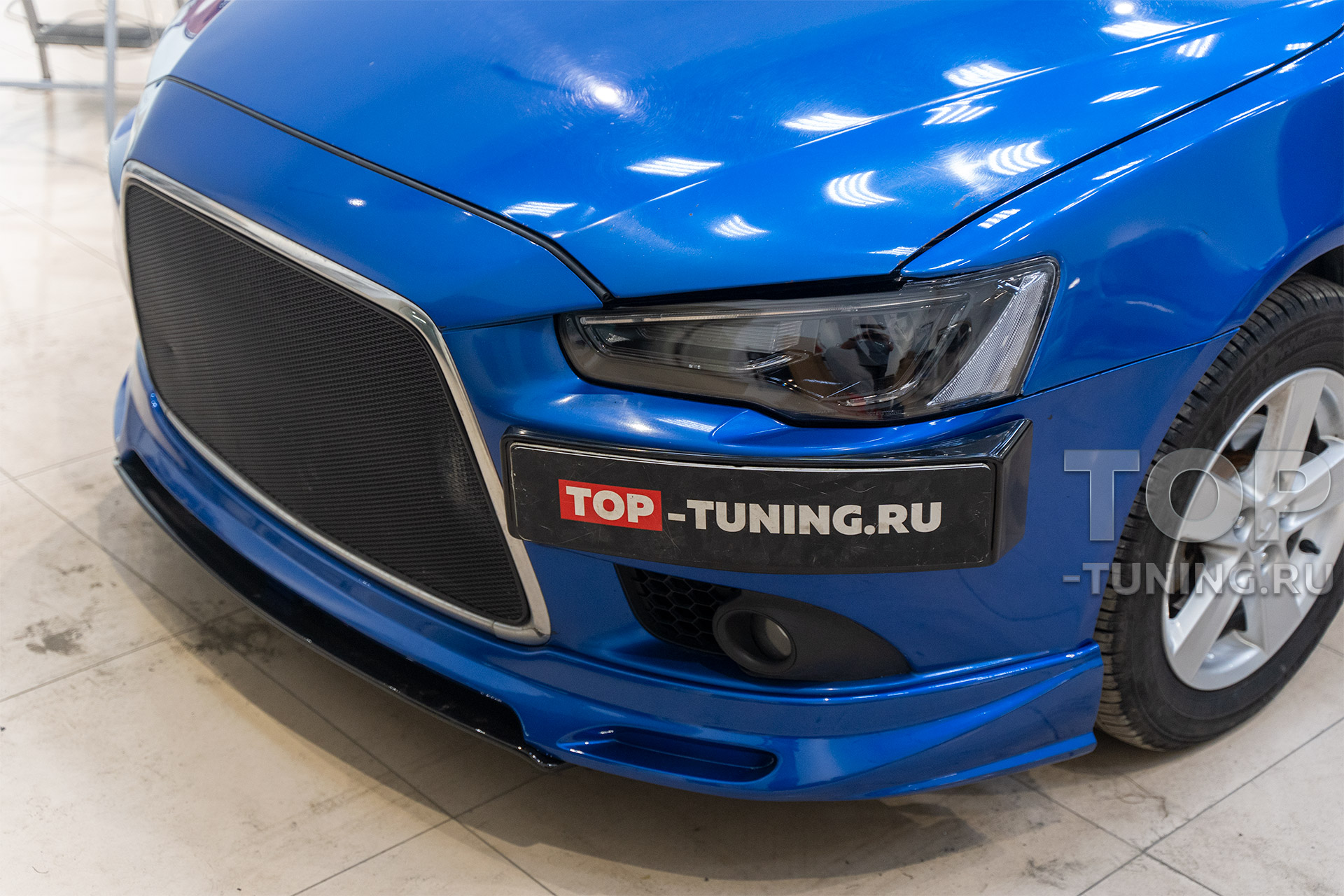 Новая внешность и мощный свет под ключ, для синего Mitsubishi Lancer X в Top Tuning Москва 