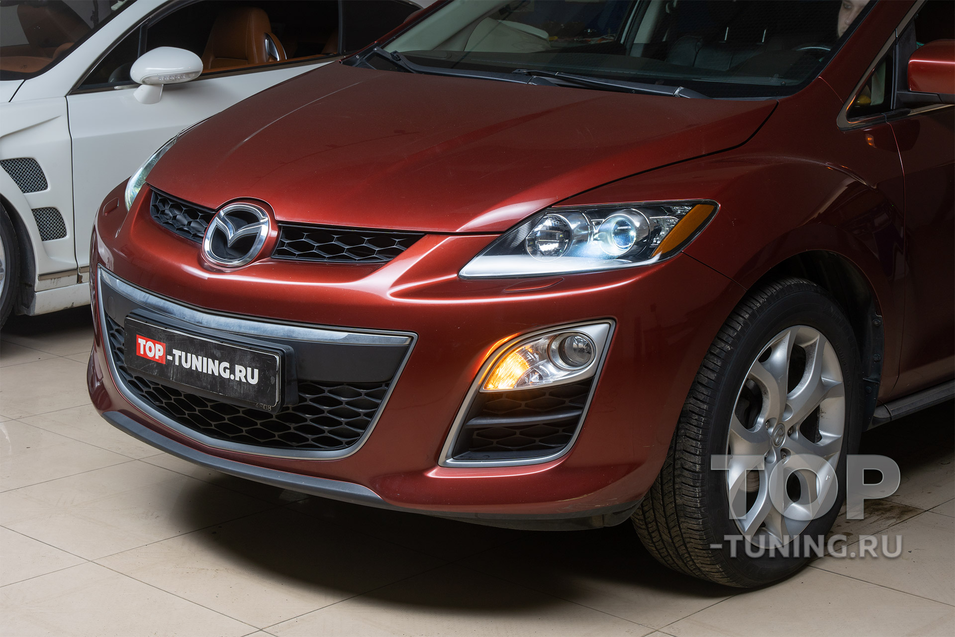 Ремонт и тюнинг оптики Mazda CX-7 2010 – линзы Bi LED Progressive