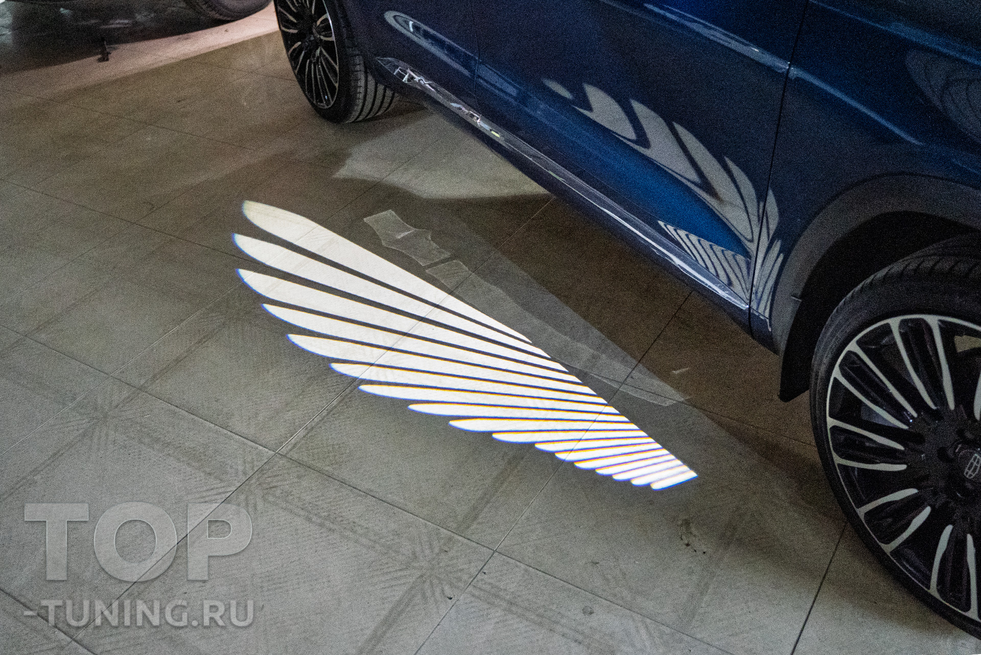 109011 Эффектная подсветка Angel Wings в боковые зеркала Geely Monjaro I