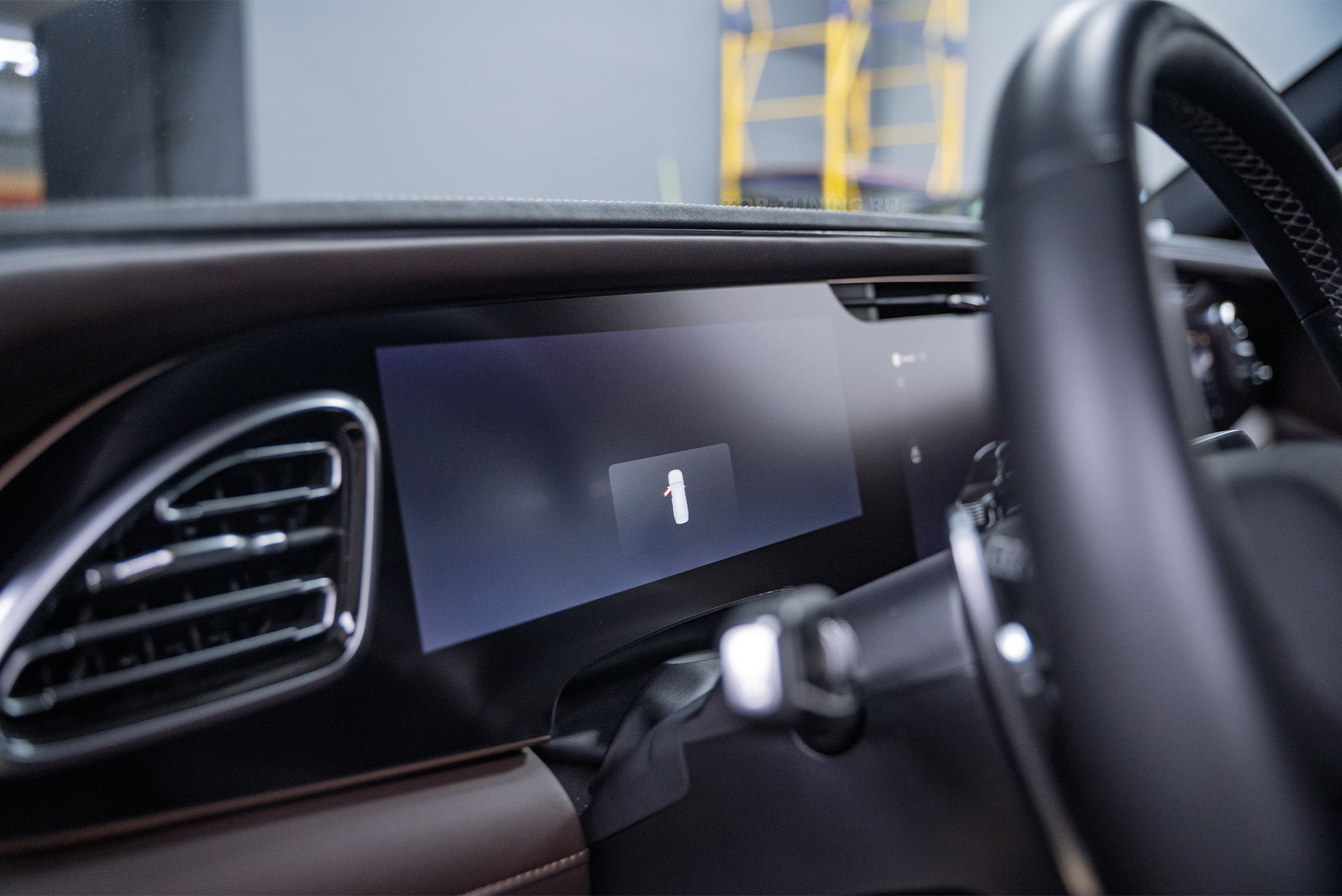 Оклейка мультимедиа и приборной панели Exeed VX рестайлинг 