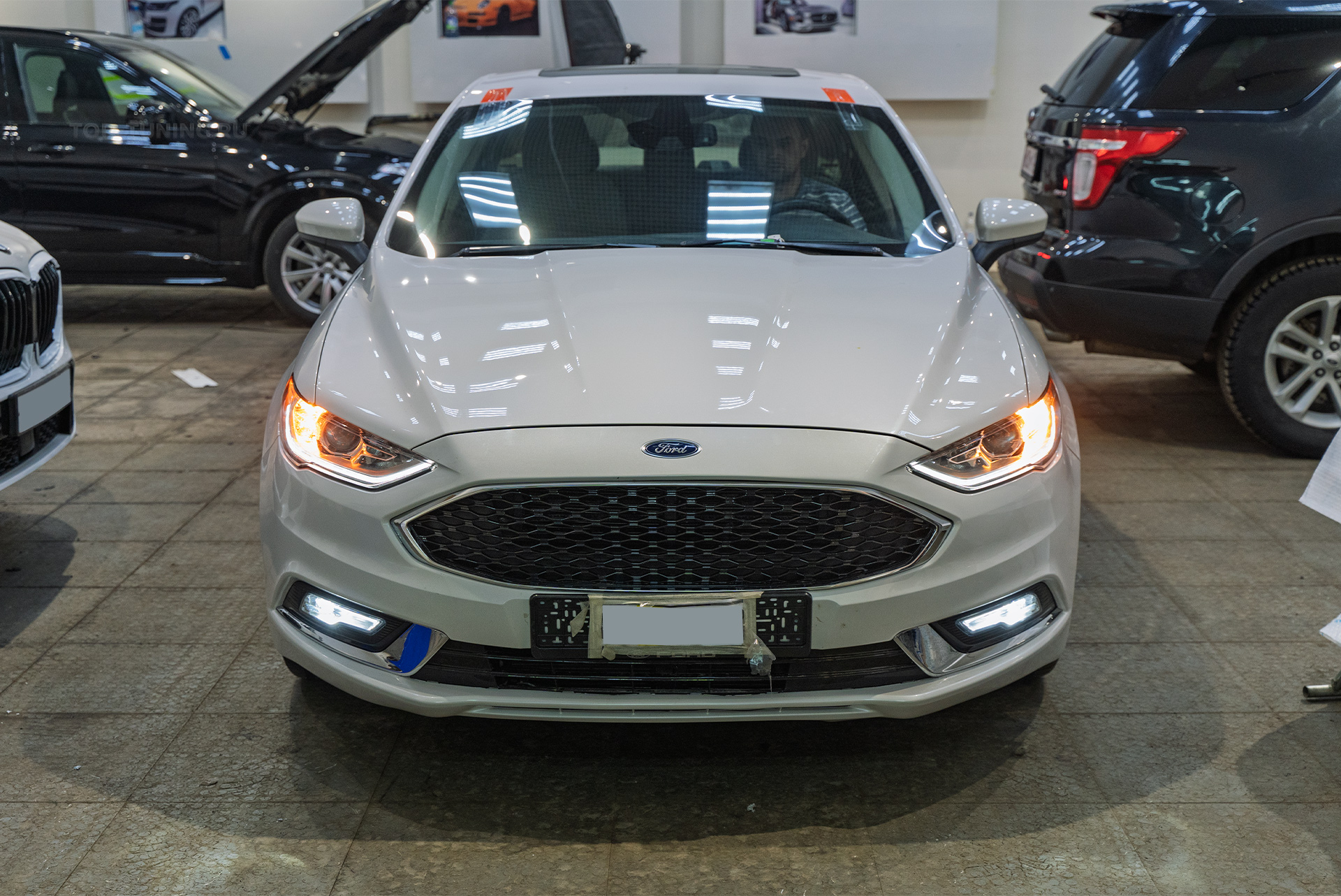 Тюнинг задних фонарей – желтые поворотники для Ford Mondeo V из США
