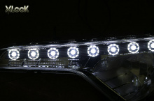 Светодиодные модули ходовых огней в передние фары - тюнинг X-Look на KIA Sportage 3.