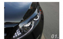 Тюнинг Киа Спортейдж 3 - накладки на переднюю оптику с 3D самосветящейся голограммой - от компании ArtX.