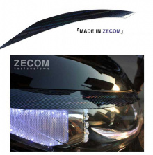 Тюнинг Киа Спортейдж 3 - накладки на переднюю оптику с 3D самосветящейся голограммой - от компании ArtX.