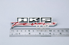 Хромированная, металлическая эмблема HKS POWER в решетку радиатора, хром - 120 х 25 мм.