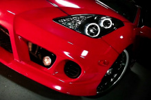 Передние светдиодные фары Черные - Тюнинг Тойота Селика. Кузов GT ST230/231. Модель с ангельскими глазками и дневными ходовыми огнями LED.