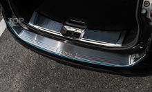 Тюнинг Nissan X-Trail -  Защитная пластина заднего бампера TECH Design Deluxe.