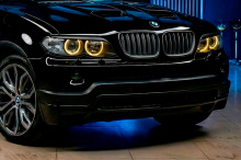 Передний бампер 4.6 IS - Обвес Перформанс — Тюнинг БМВ Х5 Е53 (Рестайлинг) 2003-2006 ABS пластик / Под окраску / Сетки в комплекте (только черные) / Без отверстий под ДХО