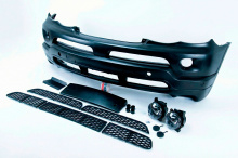 Передний бампер 4.6 IS - Обвес Перформанс — Тюнинг БМВ Х5 Е53 (Рестайлинг) 2003-2006 ABS пластик / Под окраску / Сетки в комплекте (только черные) / Без отверстий под ДХО