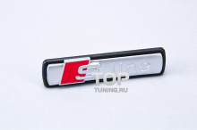 6102 Эмблема в решетку радиатора S-Line 74 x 17 на Audi