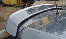 Спойлер на крышу Opel Astra H GTC стиль LMA