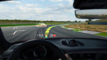 В пресс-релизе Porsche продемонстрировал, как можно использовать технологию, с такими показателями, как гоночная линия, время круга, скорость, положение передачи и информация о парковке, и всё это проецируется на стекло.
