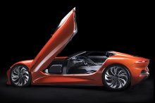Кроме того, GT оснащен собственным трехцилиндровым рядным силовым агрегатом от BMW, который питает его бортовой электрический генератор, и совершенно новым поперечно установленным задним приводным модулем с двумя двигателями, который использует элект
